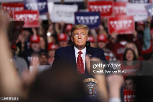 President Donald Trump appears at a rally on the eve before the South Carolina primary on February 28, 2020 in North Charleston, South Carolina. The...