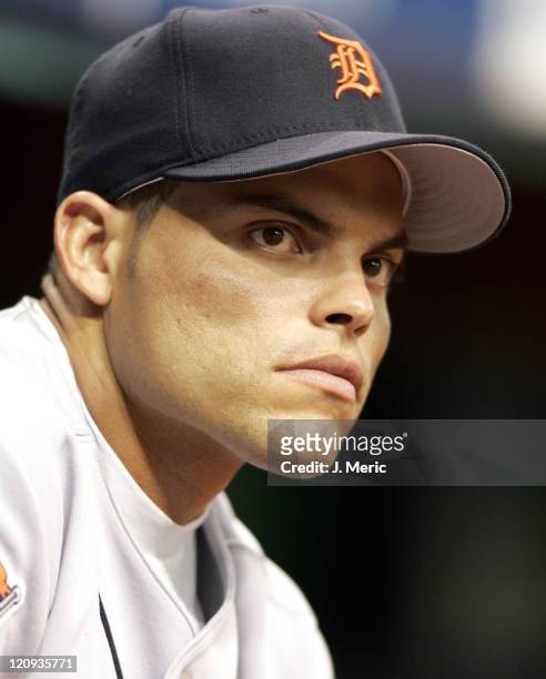 Detroit Tigers catcher Ivan Rodriguez looks out onto the field in Thursday night's game against the Tampa Bay Devil Rays at Tropicana Field in St....