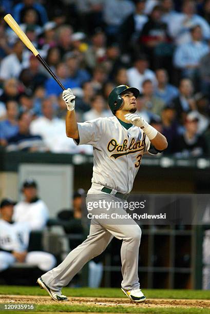 Oakland Athletics' 3rd Baseman, Eric Chavez, follows through on his 3rd inning 3-run homerun during their game against the Chicago White Sox May 23,...