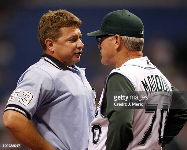 Tampa Bay Devil Rays manager Joe Maddon argues with home plate umpire Greg Gibson as Gibson ejected Jonny Gomes during Wednesday night's game against...