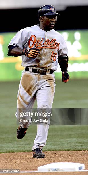 Baltimore shortstop Miguel Tejada heads into third base standing up as the Toronto Blue Jays host the Baltimore Orioles at the Rogers Centre in...