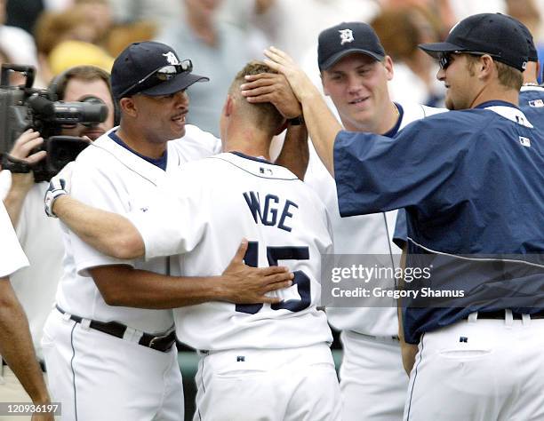 Detrot Tiger catcher Brandon Inge is congradulated by players and coaches after hitting a two run home run in the bottom of the ninth inning to beat...