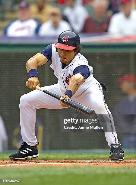 Cleveland Indians' Coco Crisp attempts a bunt during the game against the Minnesota Twins Sunday, April 17, 2005 at Jacobs Field in Cleveland. The...