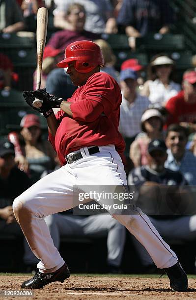 Los Angeles Angels Orlando Cabrera backs away from an inside pitch in Cactus League action vs the Seattle Mariners at Tempe Diablo Stadium in Tempe,...