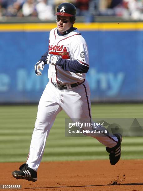 Atlanta Braves Matt Diaz rounds the bases after his home run during the game between the Atlanta Braves and the New York Mets at Turner Field in...