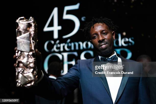 Ladj Ly poses with the Cesar for Best Film for 'Les Misérables" during the Cesar Film Awards 2020 Ceremony at Salle Pleyel on February 28, 2020 in...