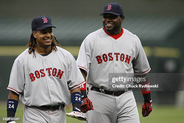 Boston Red Sox' teammates, Manny Ramirez and David Ortiz, enjoy a laugh prior to the game against the Chicago White Sox July 7, 2006 at U.S. Cellular...