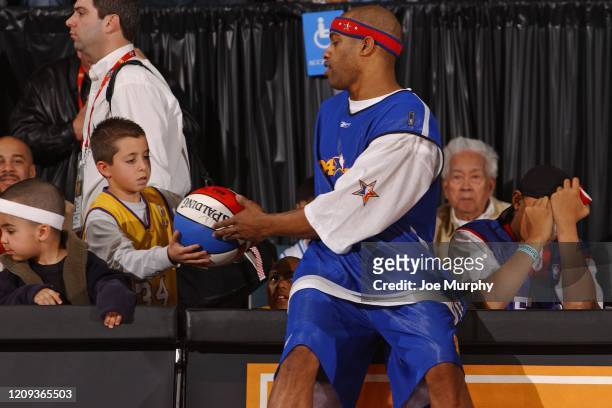 Vince Carter of the Toronto Raptors signs autographs during the Eastern All Stars Practice as part of 2004 NBA All Star Weekend on February 14, 2004...