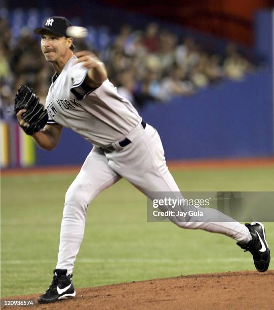 Randy Johnson pitches for the Yankees against the Toronto Blue Jays at Rogers Centre in Toronto, Canada on September 16, 2005.