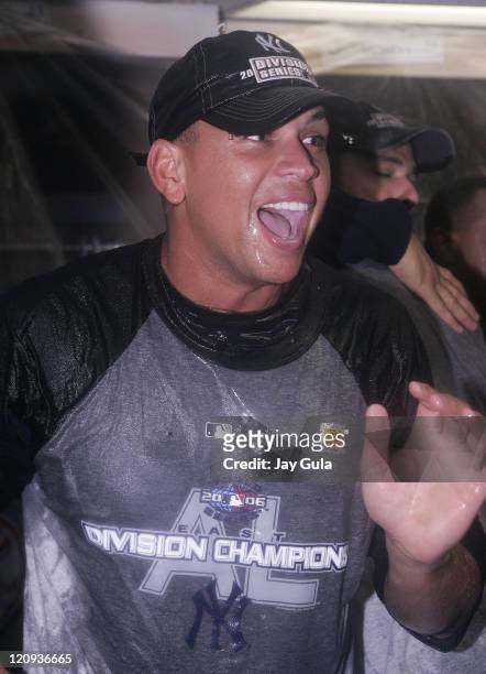 New York Yankees Alex Rodriguez is in a happy mood as he and his teammates celebrate in their clubhouse after clinching their 9th consecutive...