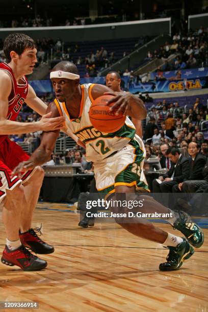 Ronald Murray of the of the Sophomore Team drives to the basket during the Rookie Challenge Presented by Got Milk as part of 2004 NBA All Star...