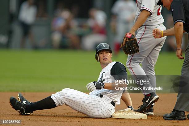 Chicago White Sox Left Fielder, Scott Podsednik, looks, in disbelief, at 2nd base umpire, Paul Nauert, after being called out at 2nd during the game...