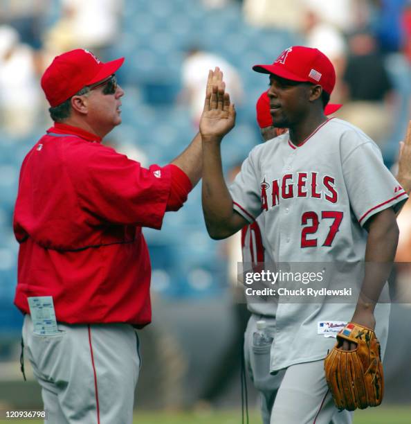 Los Angeles Angels' Manager, Mike Scioscia and Vladimir Guerrero, celebrate their three game sweep over the White Sox September 11, 2005 at U.S....