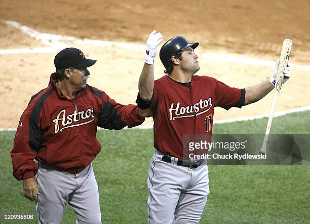 Houston Astros' Right Fielder, Lance Berkman reacts to being thrown out of the game for arguing a called third strike during their Interleague game...