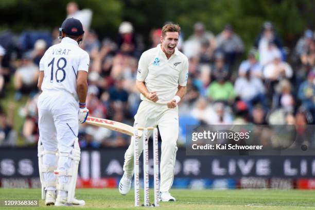 Tim Southee of New Zealand celebrates after dismissing Virat Kohli of India during day one of the Second Test match between New Zealand and India at...