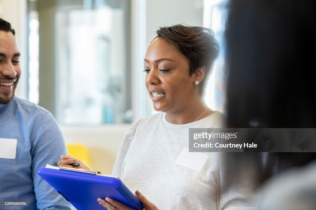 Support Group Leader Example Support Group Leader Reading Notes High-Res Stock Photo - Getty Images