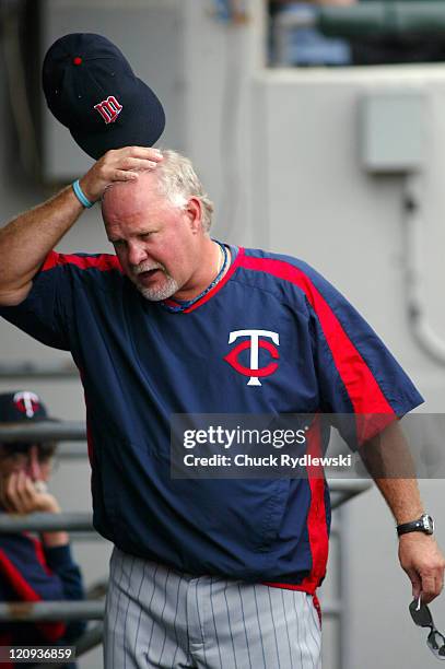 Minnesota Twins' Manager, Ron Gardenhire, scratches his head as he paces the dugout during their game against the Chicago White Sox August 27, 2006...