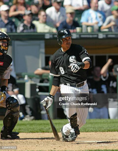 Chicago White Sox' second baseman, Alex Cintron, singles in the winning run against the Houston Astros June 24, 2006 at U.S. Cellular Field in...