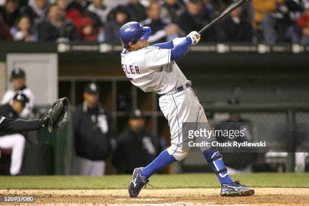 Texas Rangers' 2nd Baseman, Ian Kinsler hits a sacrifice fly to drive Sammy Sosa during their game versus the Chicago White Sox April 19, 2007 at...