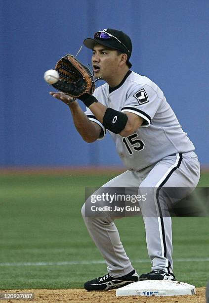 Chicago White Sox 2B Tadahito Iguchi takes a throw for a forceout at 2nd base vs the Toronto Blue Jays at Rogers Centre in Toronto, Canada on May 26,...