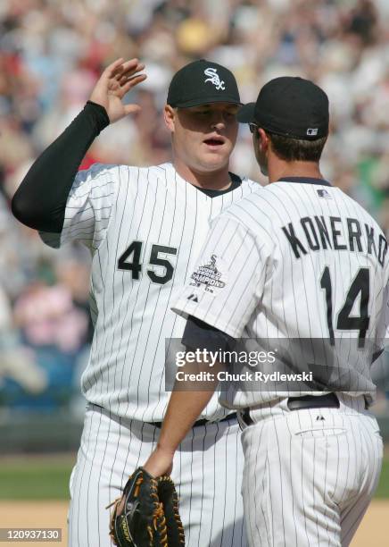 Chicago White Sox' Closer, Bobby Jenks, celebrates with teammate, Paul Konerko after closing out the Toronto Blue Jays April 15, 2006 at U.S....