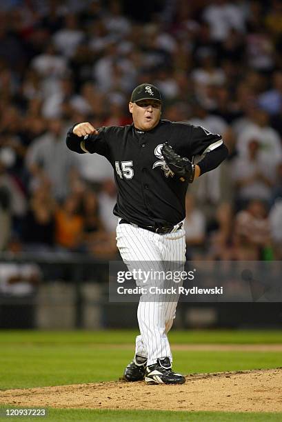 Chicago White Sox' Closer, Bobby Jenks, reacts to striking out Juan Encarnacion and closing out the St. Louis Cardinals June 22, 2006 at U.S....