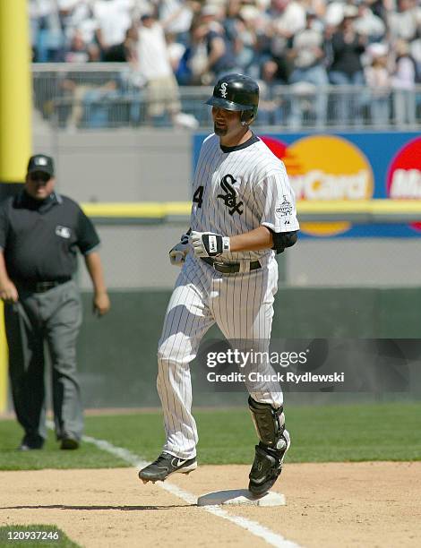 Chicago White Sox' 1st Baseman, Paul Konerko, rounds 3rd base after hitting his 2nd home run of day during the game against the Toronto Blue Jays...