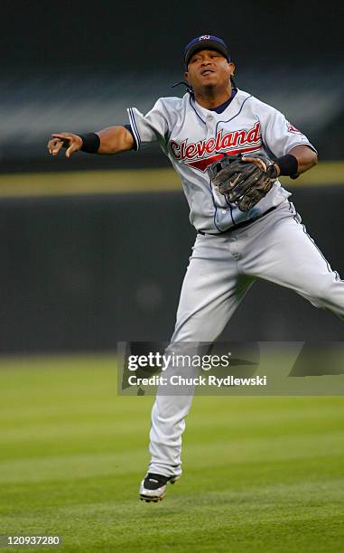 Cleveland Indians' 2nd Baseman, Ronnie Belliard, makes a tough play to throw out Tadahito Iguchi during their game against the Chicago White Sox June...