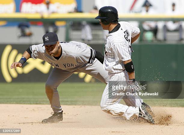 New York Yankees' Shortstop, Derek Jeter tags out Tadahito Iguchi trying to steal 2nd base during their game versus Chicago White Sox May 17, 2007 at...