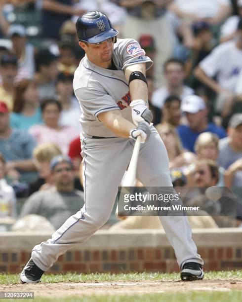 David Wright, New York Met, third baseman and 2006 All-Star, hitting a Greg Maddux pitch during game action at Wrigley Field in Chicago, Illinois on...