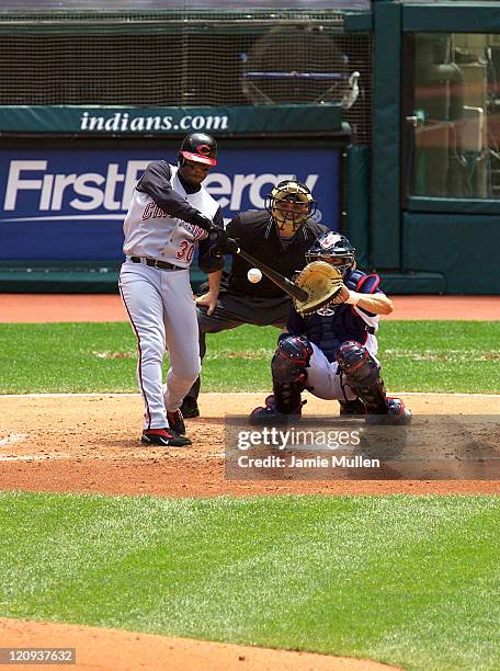 Cincinnati Reds' Ken Griffey Jr. Hits a solo home run off Cleveland Indians pitcher Cliff Lee in the third inning for Griffey's 499th career home run...