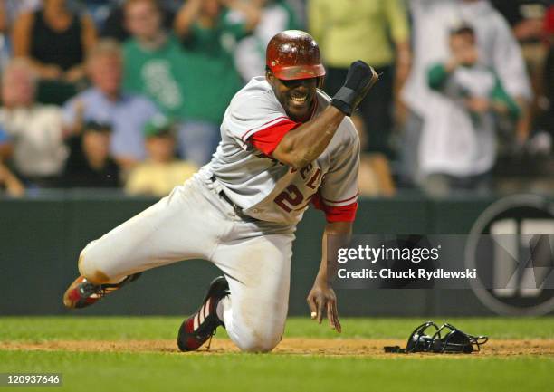 Los Angeles Angels' Right Fielder, Vladimir Guerrero, reacts to scoring from 2nd base on a sacrifice bunt in the 13th inning against the Chicago...