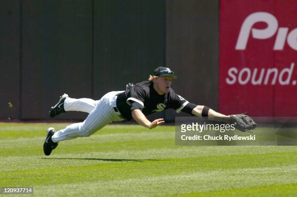 Chicago White Sox' Center Fielder, Brian Anderson, makes a leaping catch during their game against the Texas Rangers June 4, 2006 at U.S. Cellular...
