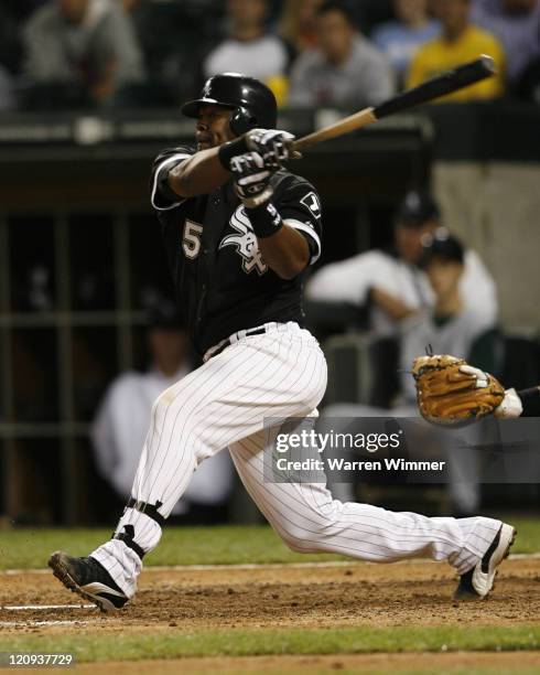 Chicago White Sox short stop Juan Uribe singles and scores the game tying run at U.S. Cellular Field, Chicago, Illinois on August 30, 2006. The White...
