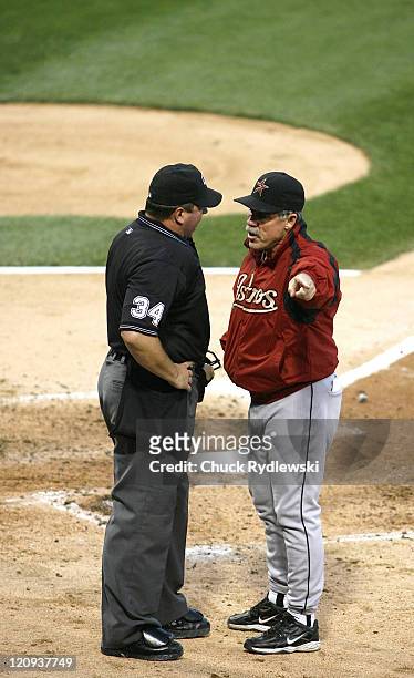 Houston Astros' Manager, Phil Garner argues a called 3rd strike with home plate umpire, Sam Holbrook who would then throw out Garner, as well as,...