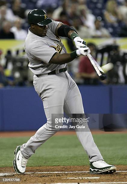 Oakland A's DH Frank Thomas launches his 27th home run of the season against the Toronto Blue Jays in MLB action at Rogers Centre in Toronto, Canada...