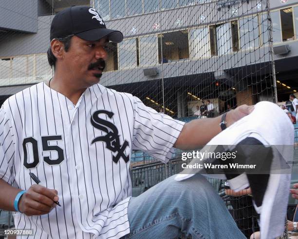 Star George Lopez signing autographs b-4 the game at US Cellular Field in Chicago Illinois, Thursday July 21, 2005. Boston Red Sox over the Chicago...