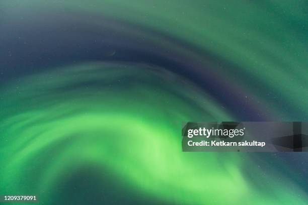 northern light (aurora borealis) phenomenon in northern iceland. - light natural phenomenon stock pictures, royalty-free photos & images