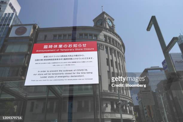 Temporary store closure sign is displayed at a Mitsukoshi department store, operated by Isetan Mitsukoshi Holdings Ltd., in Ginza shopping district...