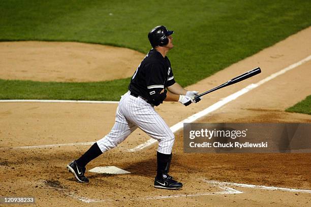 Chicago White Sox' DH/1B, Jim Thome, watches his 3rd inning 3-run home run sail into the right field bleachers during their game against the Los...