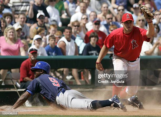 Cubs OF Juan Pierre is out at 3rd base as Angels 3B Dallas McPherson holds up the ball after tagging Pierre out in Cactus League action at Diablo...