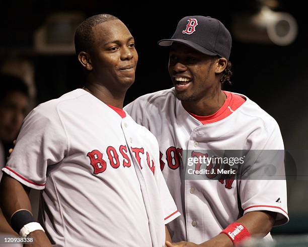 Boston's Edgar Renteria and Hanley Ramirez share a laugh prior to Wednesday night's game against the Tampa Bay Devil Rays at Tropicana Field in St....