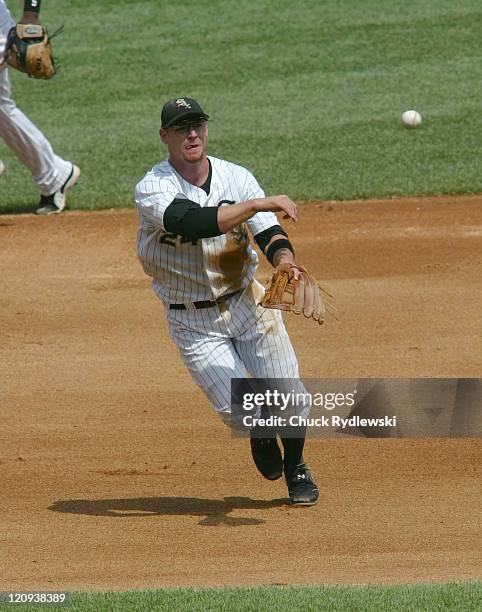 Chicago White Sox' 3rd Baseman, Joe Crede, throws out the batter during the game against the Minnesota Twins July 26, 2006 at U.S. Cellular Field in...