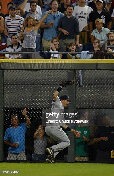 Minnesota Twins Center Fielder, Jason Tyner, hauls in Jim Thome's bid for extra bases during the game against the Chicago White Sox July 24, 2006 at...