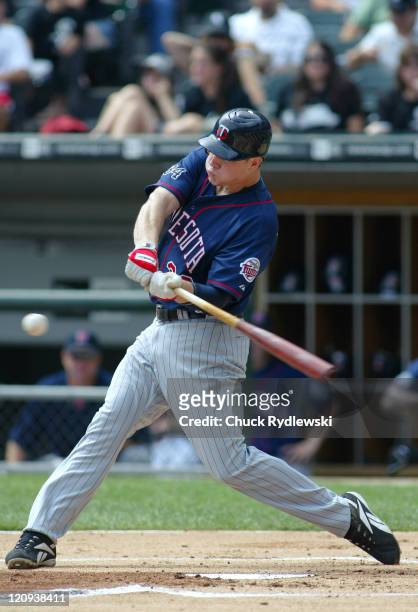 Minnesota Twins' first baseman, Justin Morneau, batting during their game against the Chicago White Sox August 27, 2006 at U.S. Cellular Field in...