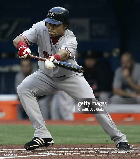 Boston Red Sox Coco Crisp lays down a bunt in MLB action vs the Toronto Blue Jays at the Rogers Centre in Toronto, Canada on May 10, 2007.