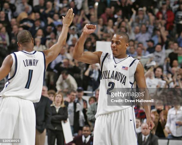 Villanova's Kyle Lowry and Randy Foye celebrate in the final seconds of the game Monday, February 13, 2006 at the Wachovia Center in Philadelphia,...