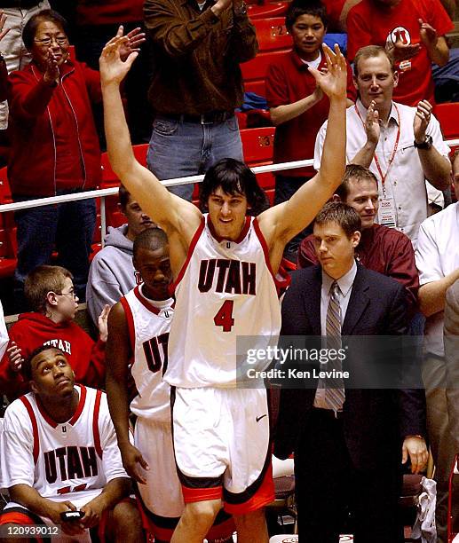 Utah center Andrew Bogut waves to the hometown fans as he was removed from the game with a minute left. Utah defeated San Diego State 72-60 at the...