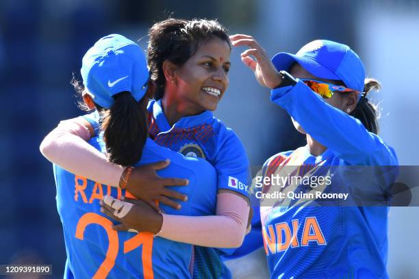 Poonam Yadav of India is congratulated by team mates after getting the wicket of Nilakshika Silva of Sri Lanka during the ICC Women's T20 Cricket...