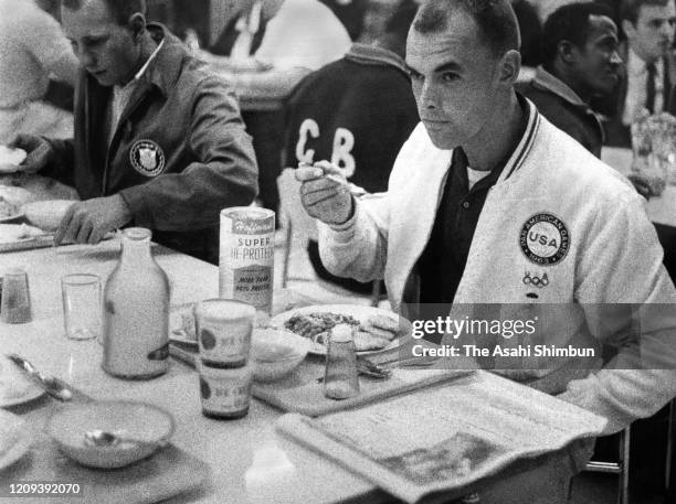 Ted Nash of the United States has meal with protein at the Athletes' Village ahead of the Tokyo Olympic Games circa October 1964 in Tokyo, Japan.